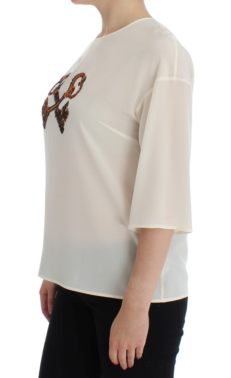 Dolce &amp; Gabbana – Weiße Seidenbluse mit Pailletten und Schlüsseldesign, T-Shirt-Oberteil