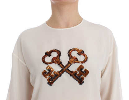 Dolce &amp; Gabbana – Weiße Seidenbluse mit Pailletten und Schlüsseldesign, T-Shirt-Oberteil