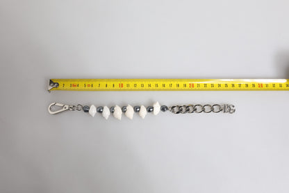 Dolce &amp; Gabbana – Armband mit Muschelanhänger und DG-Logo in Silbertönen