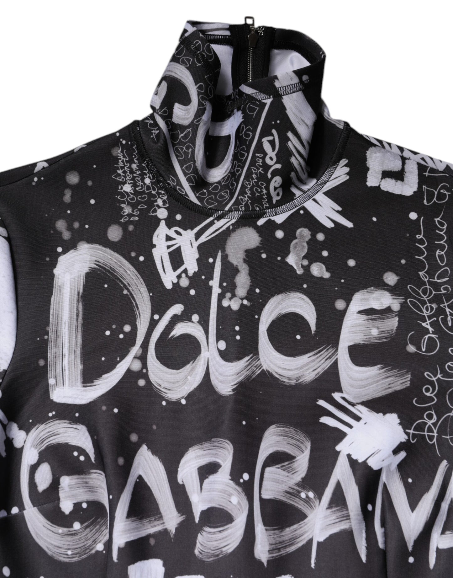Dolce &amp; Gabbana – Schwarzes, figurbetontes Jumpsuit-Kleid mit Rollkragen und Logo