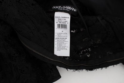Dolce &amp; Gabbana – Langes, figurbetontes Maxikleid aus geblümter Spitze in Schwarz