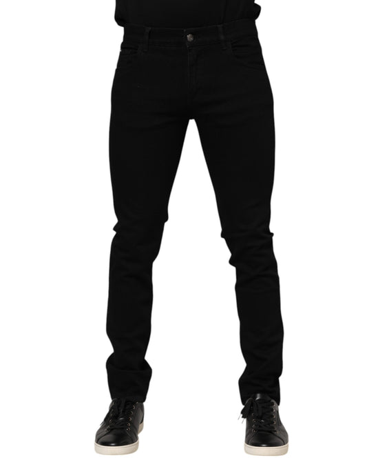 Dolce &amp; Gabbana Dunkelblaue Jeans aus Baumwolle mit Logo-Plakette in GOLD