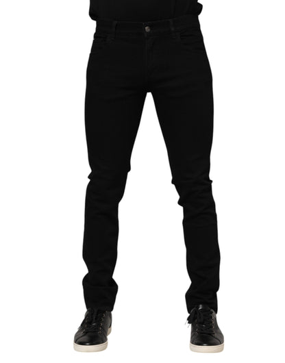 Dolce &amp; Gabbana Dunkelblaue Jeans aus Baumwolle mit Logo-Plakette in GOLD