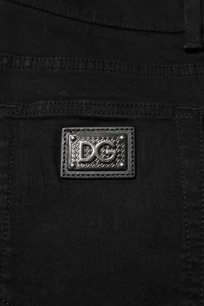 Dolce &amp; Gabbana Dunkelblaue Jeans aus Baumwolle mit Logo-Plakette in GOLD