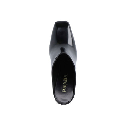Prada – Pantoletten aus Leder mit Logo
