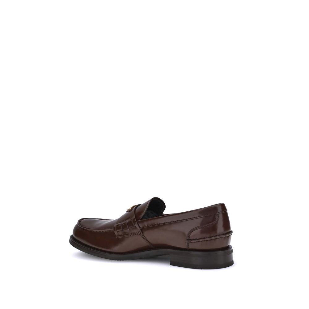 Prada Loafer mit dreieckiger Plakette