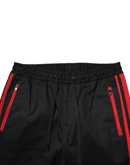 Dolce &amp; Gabbana – Jogginghose aus Baumwolle mit rotem Streifen und Logo