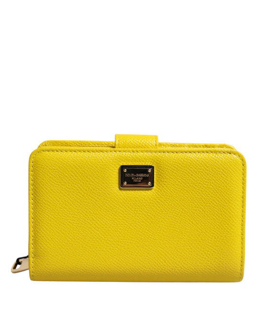 Dolce &amp; Gabbana – Zweifach gefaltete Clutch aus gelbem Leder im Continental-Stil